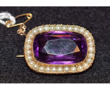 A Victorian pearl and amethyst set brooch
