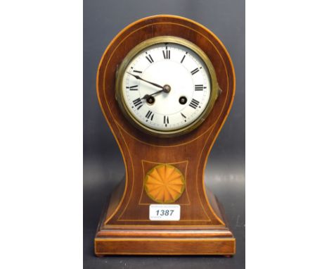 An Edwardian mahogany balloon shaped inlaid mantel clock