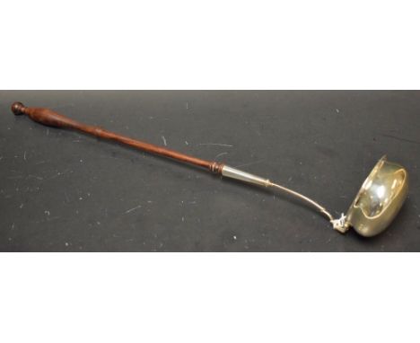 A George III style toddy ladle, turned fruitwood haft, 42cm long