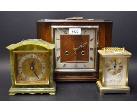 An Art Deco oak mantel clock, c.1930; green onyx clock; etc