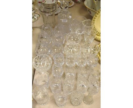 Glassware - a cut glass decanter; other cut glass including six brandy glasses; port glasses; tumblers; etc