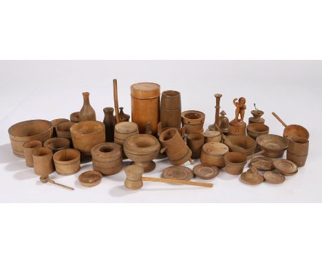 Collection of late 19th Century Swiss miniature treen containers and tools, to include dishes, churns, skillets, bottles, pai