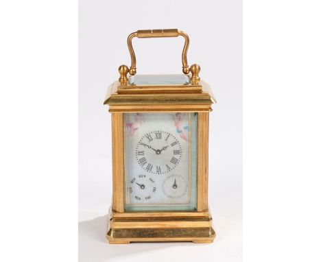 Gilt brass miniature carriage clock, with putti enamel porcelain panels to the case, the dial with Roman hours and subsidiary