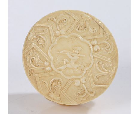 18th Century ivory snuff box, circa 1740, the lid with depcition of a figure playing a flute surrounded by fruit and scrolls,