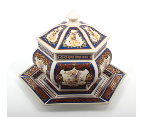 An Oriental style ceramic bowl and cover with stand