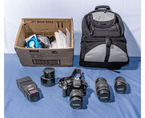 Canon EOS 450D camera complete with Canon Zoom lens EF-S 18-55mm,  Zoom lens EF 28-80mm and a Zoom lens EF 75-300mm 1.4 - 5.6