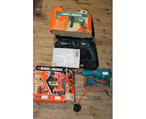 Three Black and Decker electric tools 