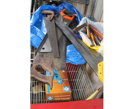 A selection of vintage hand saws and other tools 'no postage available' 