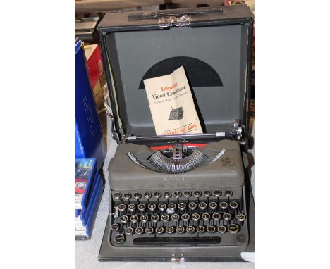 A vintage Imperial portable typewriter. Postage unavailable 