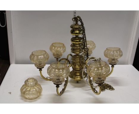 A vintage mid-century heavy brass ceiling light and shades. Postage unavailable 