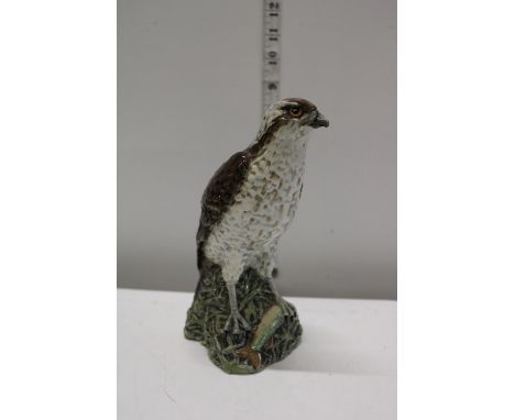 A sealed Beneagles Scotch Whiskey decanter by Beswick (Slight chip to the beak) 