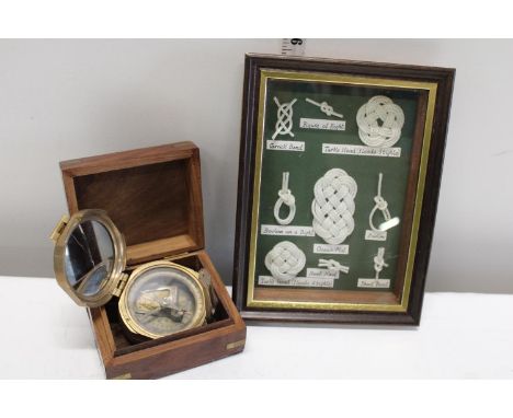A boxed brass compass and framed not display (compass needs attention) 