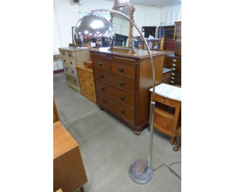A chrome standard lamp
