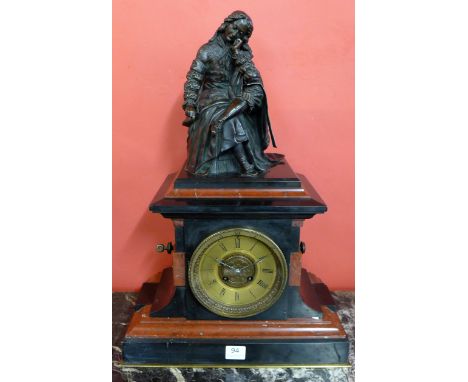 A 19th Century French Belge noir and rouge marble mantel clock, surmounted with bronze figure of Rene Antoine Ferchault de Re