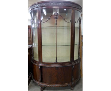 An Edward VII Chippendale Revival mahogany bow front display cabinet