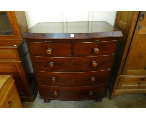 A Victorian mahogany bow front chest of drawers