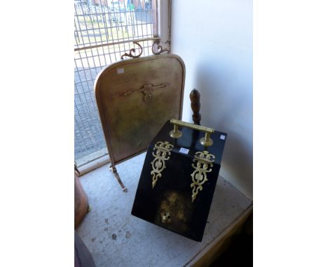 A Victorian coal scuttle and brass fire screen