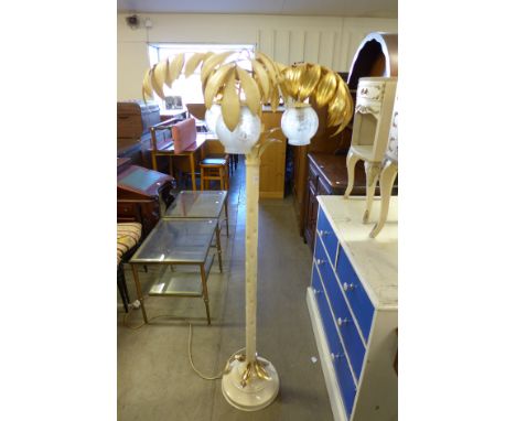 A painted metal palm tree style standard lamp