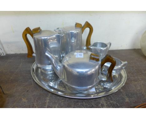 A Picquot Ware tea and coffee service and associated tray