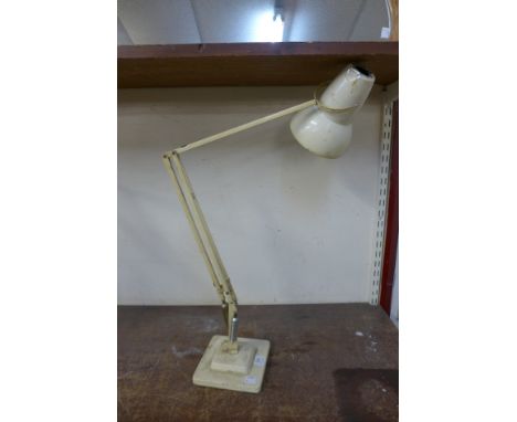 A white anglepoise lamp