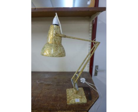 A mottled effect anglepoise lamp