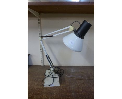 A white anglepoise lamp