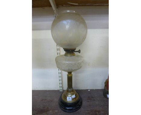 A Victorian brass oil lamp