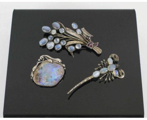 ART NOUVEAU OPAL &amp; SILVER BROOCH, in the style of Sybil Dunlop, a moonstone and ruby spray brooch circa 1940 and a scorpi