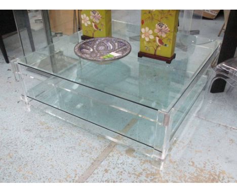 LOW TABLE, glass top and under shelf, on square Perspex supports, 124cm sq. x 45cm H.