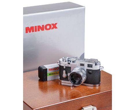 * Minox. Miniature Leica M3 film camera, manufactured in Japan for Minox GmbH, model number 60501, serial number M3-E01855, b