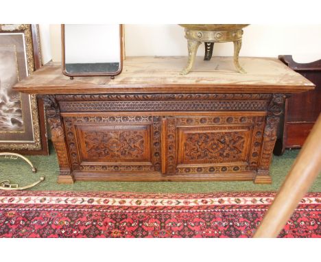 Interesting Late 19thC Oak carved 2 door cabinet with lions head drop and panel doors 140cm in Width 