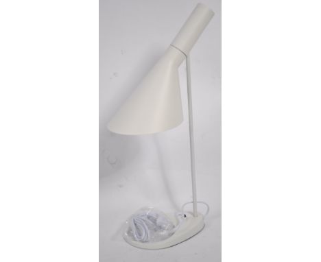 After Arne Jacobsen for Louis Poulsen 1960's, A retro white AJ desk lamp. Comprising of a tilting movement within a shaped co