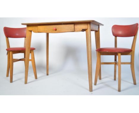 A vintage mid 20th century Beech wood  kitchen dining table with a red Formica top and drawer to one end together with three 