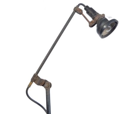 An original 1920's Singer Sewing Machine Company American bakelite anglepoise spot lamp of Industrial construction having rem