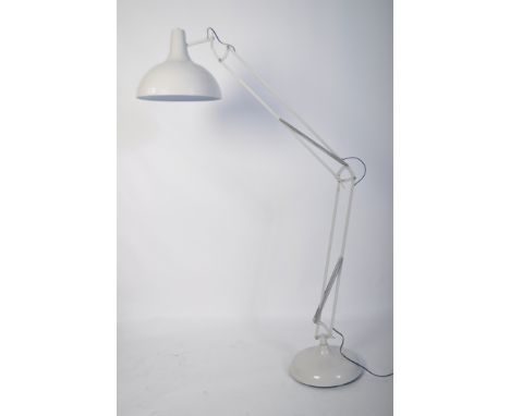 A large Industrial style floor standing anglepoise standard lamp in the manner of Herbert Terry. White with large terraced ba