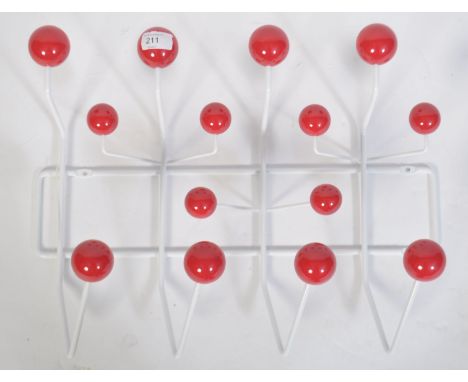 A contemporary Eames style ' Hang It all ' atomic space age revival coat rack set of hooks made of tubular white metal constr