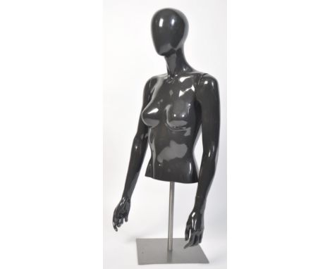 A high quality Italian made mannequin bust with removable adjustable arms and adjustable hands.  This high gloss slate grey m
