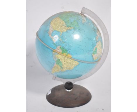 A 20th century table top globe by Nova Editions Rico Florence. Raised on faux rosewood with clear plastic rule mount. Globe s