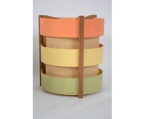 A vintage mid 20th century retro lampshade of circular wooden construction having painted and rattan weave bands. Measures 23