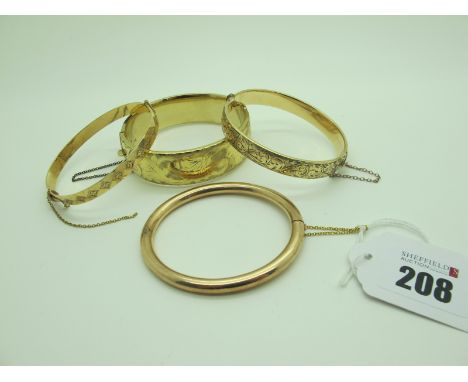 A Hinged Bangle, of plain design hinged to snap clasp; together with a wide hinged bangle, leaf scroll engraved to the front,