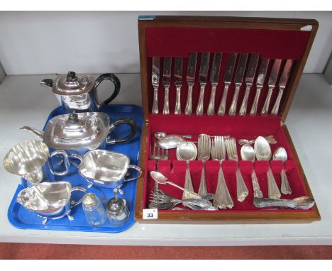 An Art Deco Style Electroplated Four Piece Tea Set, decorative set of cake forks and teaspoons, a part canteen and further as