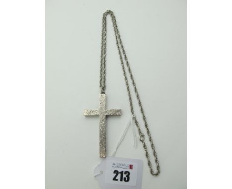 A Large Solid Hallmarked Silver Cross Pendant, with scroll engraving, 6.3cm long (37grams), on chain.