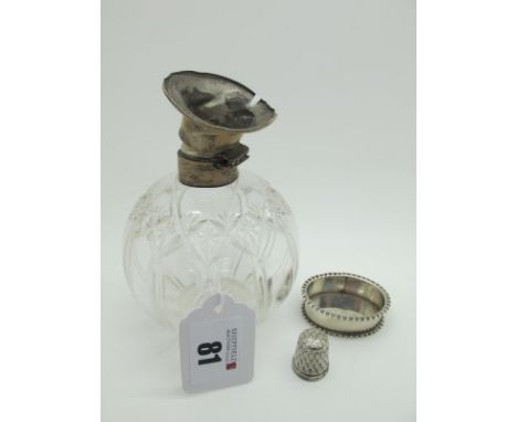 A Small Hallmarked Silver Oval Pin Dish, together with a hallmarked silver thimble; a hallmarked silver topped globular glass
