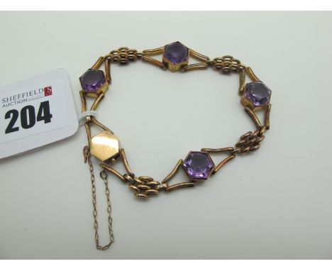 A Collet Set Gate Style Bracelet, of alternate openwork design, to snap clasp and safety chain (12.5grams).