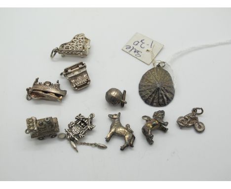 A Collection of Assorted Novelty Charm Pendants, including ship, grand piano, cuckoo clock, typewriter etc. 