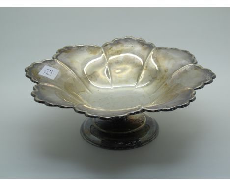 A Hallmarked Silver Footed Dish, HA, Sheffield 1945, of shaped design, on circular spreading base, 26cm diameter (375grams). 