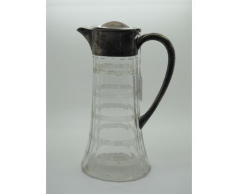 A Hallmarked Silver Mounted Glass Claret Jug, Birmingham 1901, of tapering design with reeded bands, overall height approxima