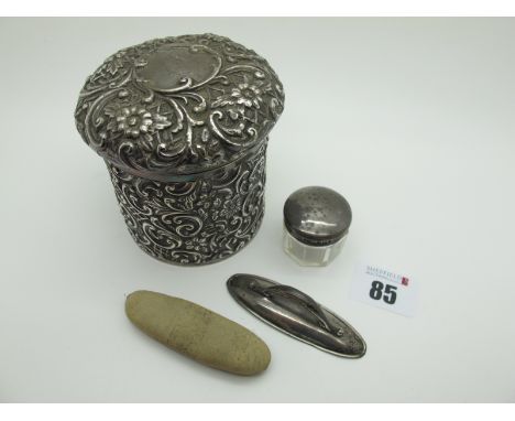 A Hallmarked Silver Lidded Tidy Jar, Henry Matthews, Birmingham 1900, allover profusely detailed in relief with flowerheads a