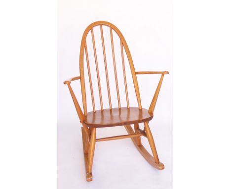 An Ercol beech and elm rocking chair