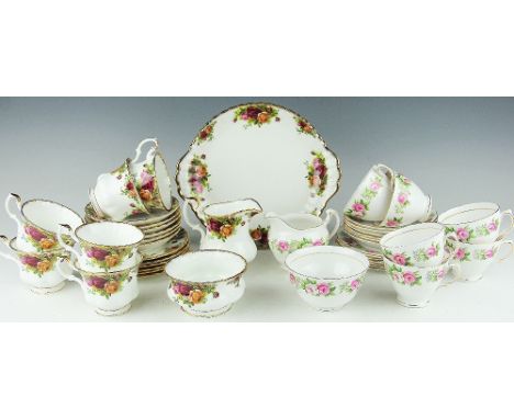 A Royal Albert Old Country Roses pattern tea service for six, comprising; cups and saucers, side plates, a bread and butter, 